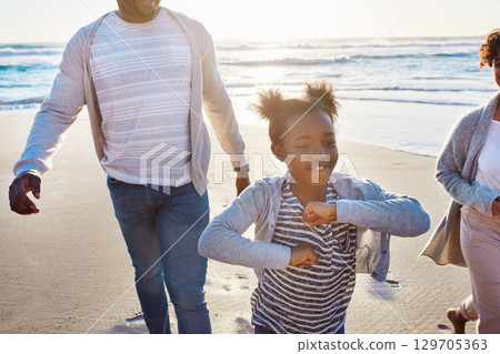 Black family, beach and father walking, kids playing and enjoy fun outdoor quality time together on Jamaica vacation. Ocean sea water, freedom peace and young youth children running on nature sand Black family, beach and father walking, kids playing and enjoy fun outdoor quality time together on Jamaica vacation. Ocean sea water, freedom peace and young youth children running on nature sand 129705363