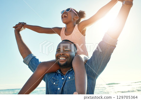 Summer, beach and girl on shoulder of father enjoying holiday, vacation and freedom on weekend. Black family, travel and happy dad and child smile on adventure for bonding, relaxing and fun by ocean Summer, beach and girl on shoulder of father enjoying holiday, vacation and freedom on weekend. Black family, travel and happy dad and child smile on adventure for bonding, relaxing and fun by ocean 129705364