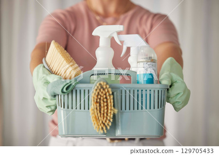Cleaning products, cleaner service hands and home clean basket for house disinfection of dusk. Chemical, brush and woman hand in a household with hygiene equipment and rubber gloves ready for work Cleaning products, cleaner service hands and home clean basket for house disinfection of dusk. Chemical, brush and woman hand in a household with hygiene equipment and rubber gloves ready for work 129705433
