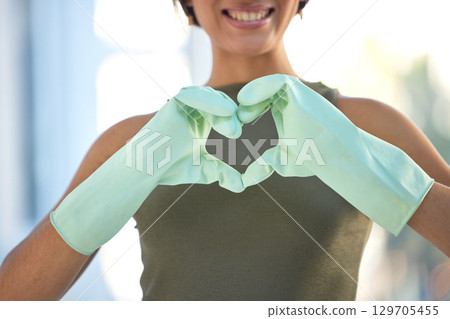Cleaner with heart hand, love cleaning with woman, housekeeping with gloves for safety, disinfection and health. Emoji, clean and housekeeper with domestic service, wellness and happy person 129705455