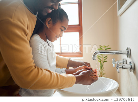 Man with girl, washing hands for hygiene in bathroom and disinfection, cleaning and self care with water for wash. Father, daughter quality time together and clean hand, happy family with health Man with girl, washing hands for hygiene in bathroom and disinfection, cleaning and self care with water for wash. Father, daughter quality time together and clean hand, happy family with health 129705615