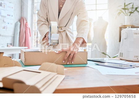 Fashion store, box and women hands tape stock product for commercial distribution, courier shipping or export delivery. Logistics, retail packaging container or employee work in supply chain industry 129705658
