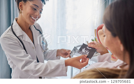 Doctor, pregnant woman and ultrasound photo with happiness, excited and family planning in clinic. Black woman medic, sonogram picture and healthcare for mother patient in hospital for pregnancy care Doctor, pregnant woman and ultrasound photo with happiness, excited and family planning in clinic. Black woman medic, sonogram picture and healthcare for mother patient in hospital for pregnancy care 129705681
