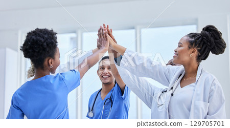 Success, high five and teamwork with doctors in hospital cheering for celebration, support or goal. Medical, healthcare and medicine with group of people and gesture for achievement, target or winner Success, high five and teamwork with doctors in hospital cheering for celebration, support or goal. Medical, healthcare and medicine with group of people and gesture for achievement, target or winner 129705701