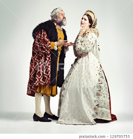 Anger, medieval and king with queen on a white background for argument, frustrated and fighting. History, theatre and royal couple in vintage, renaissance and Victorian cosplay isolated in studio Anger, medieval and king with queen on a white background for argument, frustrated and fighting. History, theatre and royal couple in vintage, renaissance and Victorian cosplay isolated in studio 129705755