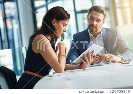 Business people, tablet and conversation planning marketing strategy, digital research or web design management in office. Teamwork web discussion, tech device and ux designer ideas conversation 129705849
