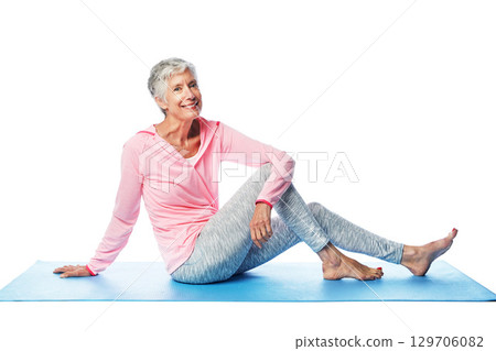 Yoga portrait, senior and woman in studio isolated on a white background. Zen chakra, pilates fitness and retired, elderly and happy female sitting on mat after training for wellness and health. Yoga portrait, senior and woman in studio isolated on a white background. Zen chakra, pilates fitness and retired, elderly and happy female sitting on mat after training for wellness and health. 129706082
