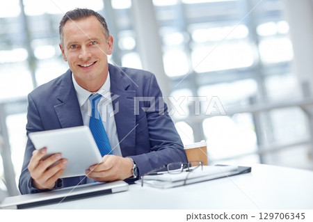 Smile, corporate or businessman with tablet for invest strategy, finance growth or financial review. CEO, portrait or manager in office building planning, data analysis or economy data analytics read 129706345