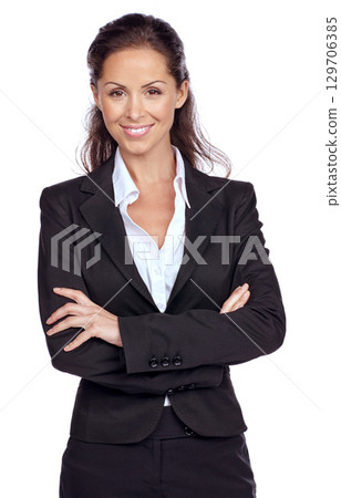 Woman, studio portrait and arms crossed with corporate goal, smile or happiness by white background. Isolated executive, business leader or happy for career, innovation or success with company vision 129706385