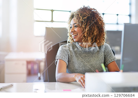 Thinking, working and motivation with a business black woman sitting her desk in the company office. Idea, inspiration and vision with a young female employee at work on a target or goal Thinking, working and motivation with a business black woman sitting her desk in the company office. Idea, inspiration and vision with a young female employee at work on a target or goal 129706684
