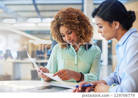 Human resources, interview and resume with a woman manager and candidate meeting at work. Business, contract and review with a female employer working on recruitment or hiring of staff in the office 129706779