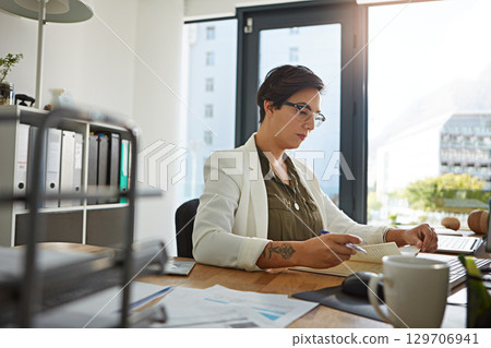 Writing, notebook and business woman planning schedule, workflow ideas and company administration at her desk. Paperwork, notes and corporate secretary, office worker or employee with career strategy 129706941