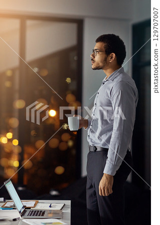 Coffee, night and businessman thinking of an email on a laptop, planning and working in an office. Idea, deadline and employee with a tea drink and a computer for a proposal during overtime at work Coffee, night and businessman thinking of an email on a laptop, planning and working in an office. Idea, deadline and employee with a tea drink and a computer for a proposal during overtime at work 129707007