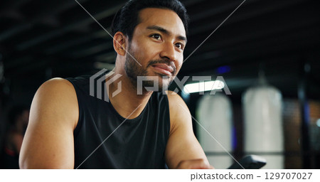 Thinking, athlete and man in gym, routine or plan for exercise, bodybuilding or decision for health. Fitness center, bodybuilder and person with equipment for workout, wellness and contemplating Thinking, athlete and man in gym, routine or plan for exercise, bodybuilding or decision for health. Fitness center, bodybuilder and person with equipment for workout, wellness and contemplating 129707027