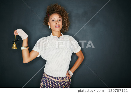 Black woman, fashion portrait and ring bell with mockup blackboard space for hospitality or waitress. Female model with vintage brass teacher object for advertising sale product placement or service 129707131