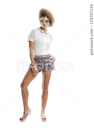 Fashion, designer style and portrait of a black woman in stylish sunglasses with white background. Isolated, cool and beauty of model with hipster clothing in a studio with mock up space alone Fashion, designer style and portrait of a black woman in stylish sunglasses with white background. Isolated, cool and beauty of model with hipster clothing in a studio with mock up space alone 129707134