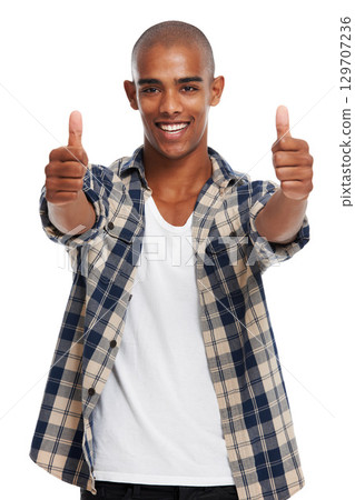 Young african man, success and thumbs up portrait of yes, achievement and winner hands sign. Thank you, happiness and ok agreement satisfaction hand gesture of a black man with motivation from goal 129707236