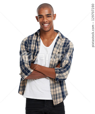 Portrait, fashion and bald with a black man arms crossed in studio standing on a white background in casual clothes. Face, happy and smile with a handsome young male posing in contemporary clothing 129707280