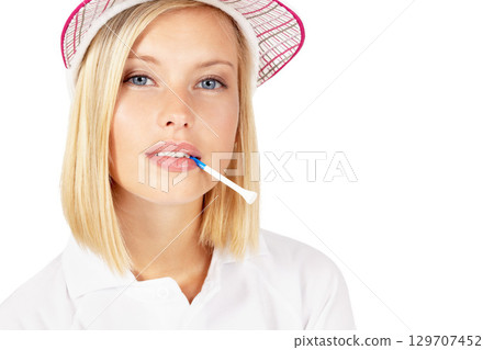 Portrait, golf and mockup with a sports woman biting a tee in studio isolated on a white background. Face, game and sportswear with a female golfer posing on blank space for advertising or marketing Portrait, golf and mockup with a sports woman biting a tee in studio isolated on a white background. Face, game and sportswear with a female golfer posing on blank space for advertising or marketing 129707452