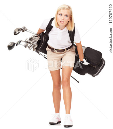 Sports, athlete and woman golfer in a studio with clubs for exercise, training or golfing motivation. Fitness, golf and female model carrying heavy sport equipment isolated by a white background. 129707460