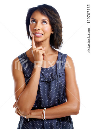 Face, thinking and decision of woman in studio isolated on a white background. Planning solution, ideas and female model contemplating memory, pensive or lost in thoughts, nostalgic or inspiration. 129707585