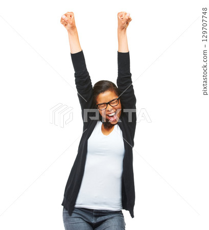 Winner, achievement and woman in celebration in a studio with excitement, happiness or goal. Happy, winner and excited female model or student with glasses celebrating isolated by a white background. 129707748