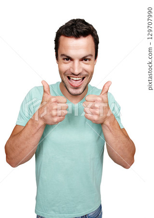 Portrait, thumbs up and review with a man in studio isolated on a white background as a winner or for motivation. Thank you, goal and target with an excited man showing a positive hand sign or emoji 129707990
