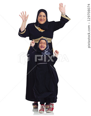 Portrait, children or muslim with a mother and daughter in studio isolated on a white background together as a family. Eid, love or islam with a woman and girl bonding on blank space for religion Portrait, children or muslim with a mother and daughter in studio isolated on a white background together as a family. Eid, love or islam with a woman and girl bonding on blank space for religion 129708074