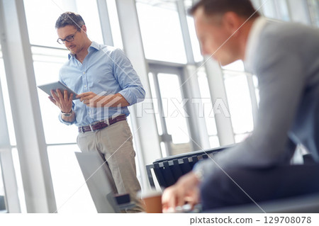 Tablet, corporate or business man standing in airport lobby for invest strategy, finance growth or financial success. CEO, travel or manager with tech planning, social media or network blog 129708078