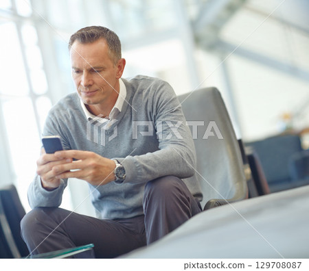 Travel, research or business man with phone for invest strategy, finance growth or financial review. CEO, airport or manager with smartphone for planning, data analysis or investment economy search Travel, research or business man with phone for invest strategy, finance growth or financial review. CEO, airport or manager with smartphone for planning, data analysis or investment economy search 129708087