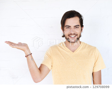 Mockup gesture, studio portrait and happy man with sales promo, luxury present gift or discount deal mock up. Marketing space, product placement or advertising model isolated on white background wall Mockup gesture, studio portrait and happy man with sales promo, luxury present gift or discount deal mock up. Marketing space, product placement or advertising model isolated on white background wall 129708099