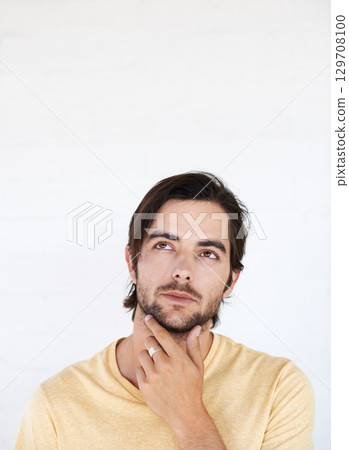 Idea mockup, face and man thinking, pensive and focus on contemplating problem solving plan. Studio marketing space, advertising mock up and model product placement isolated on white background wall Idea mockup, face and man thinking, pensive and focus on contemplating problem solving plan. Studio marketing space, advertising mock up and model product placement isolated on white background wall 129708100
