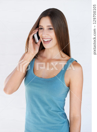 Phone call communication, happy and woman talking, gossip or networking chat to digital mobile contact. Smartphone user, conversation discussion and speaking studio model isolated on white background Phone call communication, happy and woman talking, gossip or networking chat to digital mobile contact. Smartphone user, conversation discussion and speaking studio model isolated on white background 129708105
