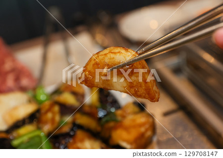 Stir-fried Potatoes, Eggplant, and Peppers. Chinese food 129708147