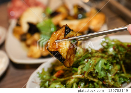 Stir-fried Potatoes, Eggplant, and Peppers. Chinese food 129708149