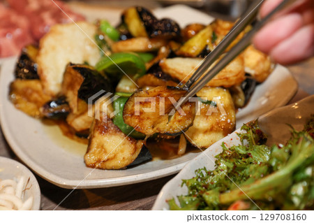 Stir-fried Potatoes, Eggplant, and Peppers. Chinese food Stir-fried Potatoes, Eggplant, and Peppers. Chinese food 129708160