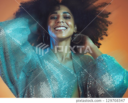 Beauty, hair and black woman with blur, face and movement with makeup and glitter against studio background. Hair care, natural curly hair and cosmetics with happiness and portrait, disco and fashion 129708347