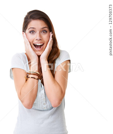 Gasp. Wow, surprise and portrait with a woman in studio on a white background saying wow or omg in an expression of shock. Happy, surprised and shoked with an attractive young female looking excited. 129708373