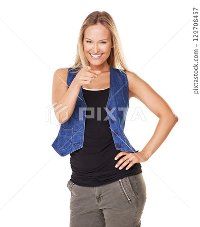 Portrait, pointing and choice with a woman in studio on a white background standing with her hand on her hip. Face, point and choosing with an attractive young female making her selection of options 129708457