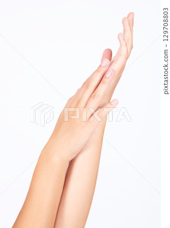 Beauty model, manicure hands and nails skincare on studio background in healthcare wellness, self love dermatology or salon massage. Zoom woman, touching fingers and natural grooming polish on mockup 129708803