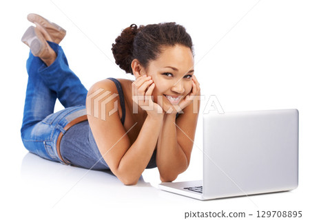 Portrait, laptop and black woman on floor of studio, isolated white background and happy face. Female model, computer and technology for social network, online shopping and internet seo, web and blog Portrait, laptop and black woman on floor of studio, isolated white background and happy face. Female model, computer and technology for social network, online shopping and internet seo, web and blog 129708895