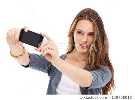 Mobile phone, studio selfie and woman with cellphone memory picture for social media app, online website or social network. Digital tech user, smartphone photo and model girl pose on white background Mobile phone, studio selfie and woman with cellphone memory picture for social media app, online website or social network. Digital tech user, smartphone photo and model girl pose on white background 129708918