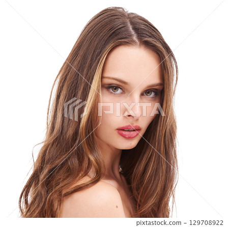 Hair care, beauty and portrait of a woman model in studio with keratin, cosmetic or botox hair treatment. Beauty, health and girl with natural, wavy and clean hair style isolated by white background. Hair care, beauty and portrait of a woman model in studio with keratin, cosmetic or botox hair treatment. Beauty, health and girl with natural, wavy and clean hair style isolated by white background. 129708922
