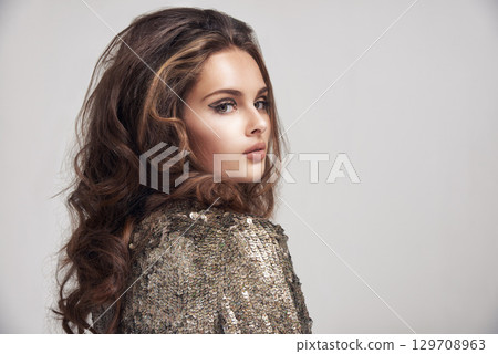Hair, beauty and face portrait of woman with eyeliner makeup, skincare and cosmetics mockup. Wavy hairstyle, salon hair care and profile of model with sparkling clothes on mock up studio background Hair, beauty and face portrait of woman with eyeliner makeup, skincare and cosmetics mockup. Wavy hairstyle, salon hair care and profile of model with sparkling clothes on mock up studio background 129708963