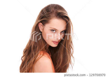 Hair, beauty and portrait of woman in studio for wellness, hygiene and grooming on white background. Haircare, face and girl model confident, beautiful and posing with beautiful hair and glow 129708970