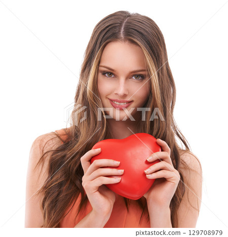 Heart, love and face portrait of woman with red object, romantic product or emoji icon for Valentines Day holiday. Beauty, smile and studio headshot of happy model girl isolated on white background 129708979