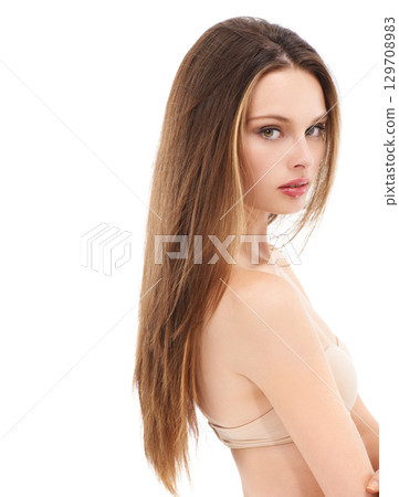 Hair care, cosmetic and portrait of a woman in studio with a keratin hair treatment. Beauty, health and female model with hair style isolated by white background with mockup space 129708983