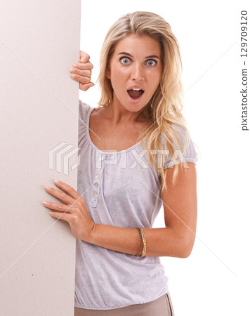 Mockup portrait, surprise or woman with poster, placard or billboard for sales advertising marketing. Studio sign, banner space and model girl shocked over discount promotion deal on white background 129709120