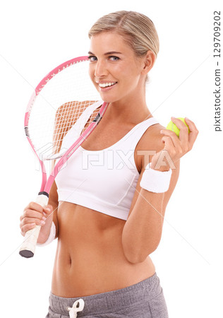 Tennis woman, studio portrait and racket with smile for health, sport and fitness by white background. Happy tennis player, focus and tennis ball in hand while isolated for training, wellness or goal Tennis woman, studio portrait and racket with smile for health, sport and fitness by white background. Happy tennis player, focus and tennis ball in hand while isolated for training, wellness or goal 129709202