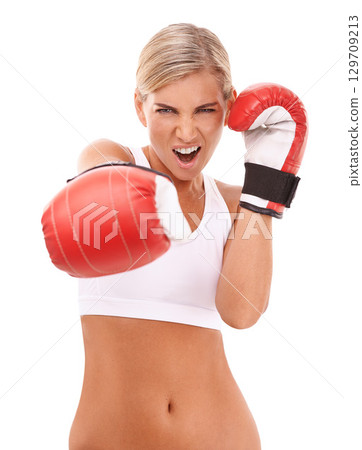 Sports, boxing gloves and portrait of woman punching with confidence and motivation to box, isolated on white background. Boxing, exercise and empowerment, female boxer ready for challenge in studio. Sports, boxing gloves and portrait of woman punching with confidence and motivation to box, isolated on white background. Boxing, exercise and empowerment, female boxer ready for challenge in studio. 129709213